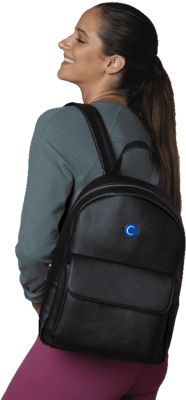 Promotional home banner for Urbness Streetwear Store featuring the Offer of the Week on outdoor essentials from designer Tom Woo, showing a model with a premium leather backpack, managed by Zizzle LLC.